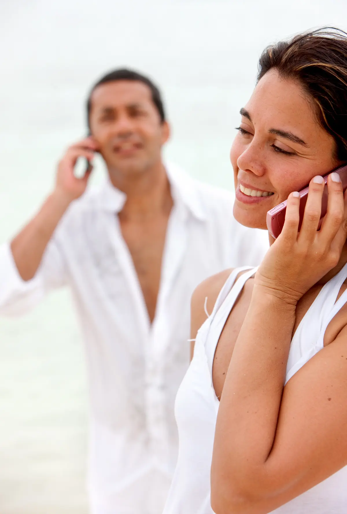 Couple talking on the phone